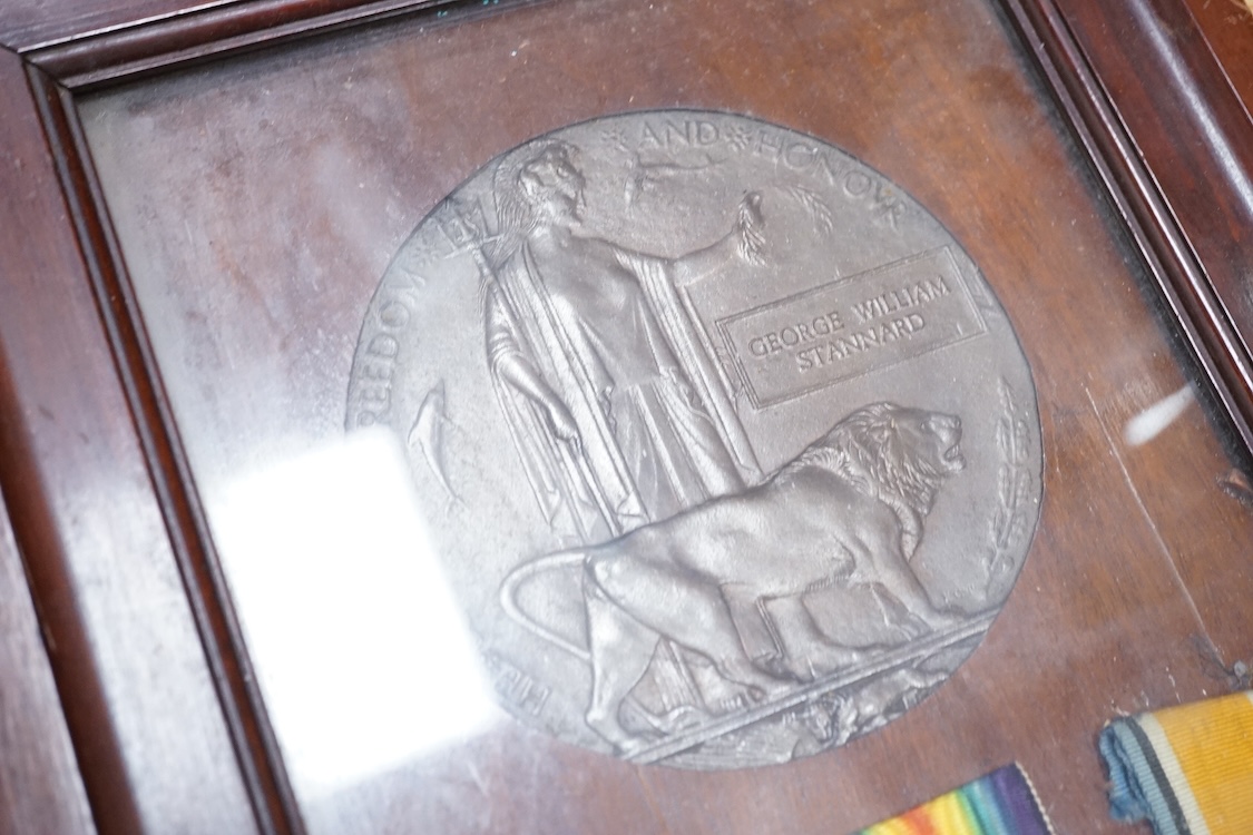 Two First World War medal groups; a framed medal trio and memorial plaque awarded to Pte. George William Stannard R.M. R.N. Division, with the scroll in a separate matching frame, together with a medal pair awarded to 20